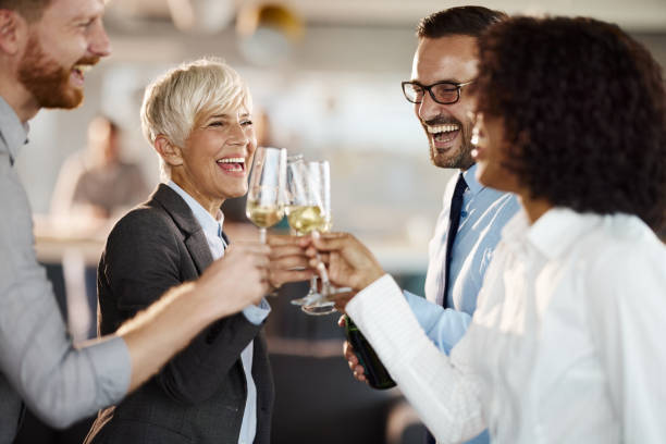 Happy clients raising a toast
