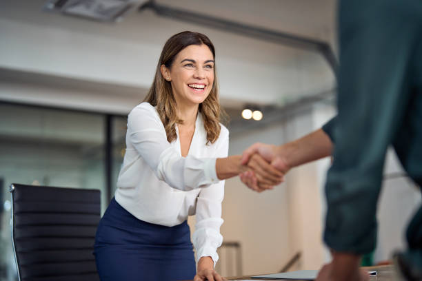 Planner greeting clients after a successful event